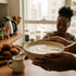 How to make pap flour into ogi and akamu: a bowl of fermented corn porridge with Pap Flour UAE pack on a West African kitchen counter in Dubai