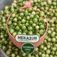 Pink scoop filled with Katunkuma green fruits labeled 'Mekazon' on a background of similar fruits.